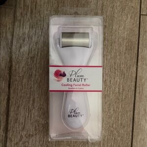 Silver and White Cooling Facial Roller